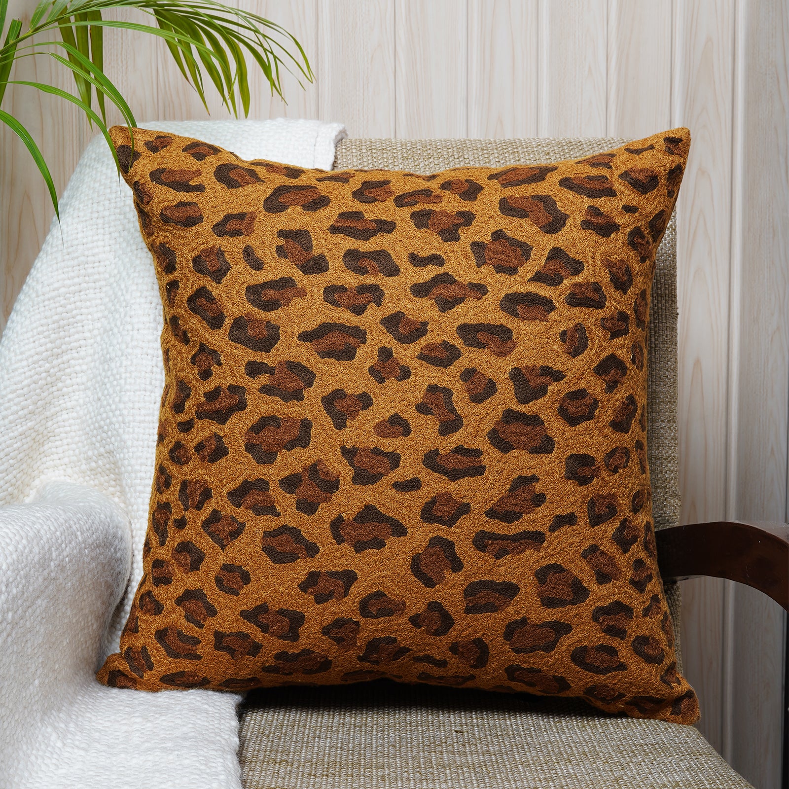 Stylish leopard pattern embroidered cushion in tan and brown tones - Dash & Twine Beauty and the Beasts Collection